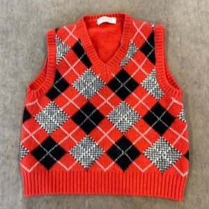 argyle sweater vest. Color/ Red, black and white. Size Med Youth. Unisex